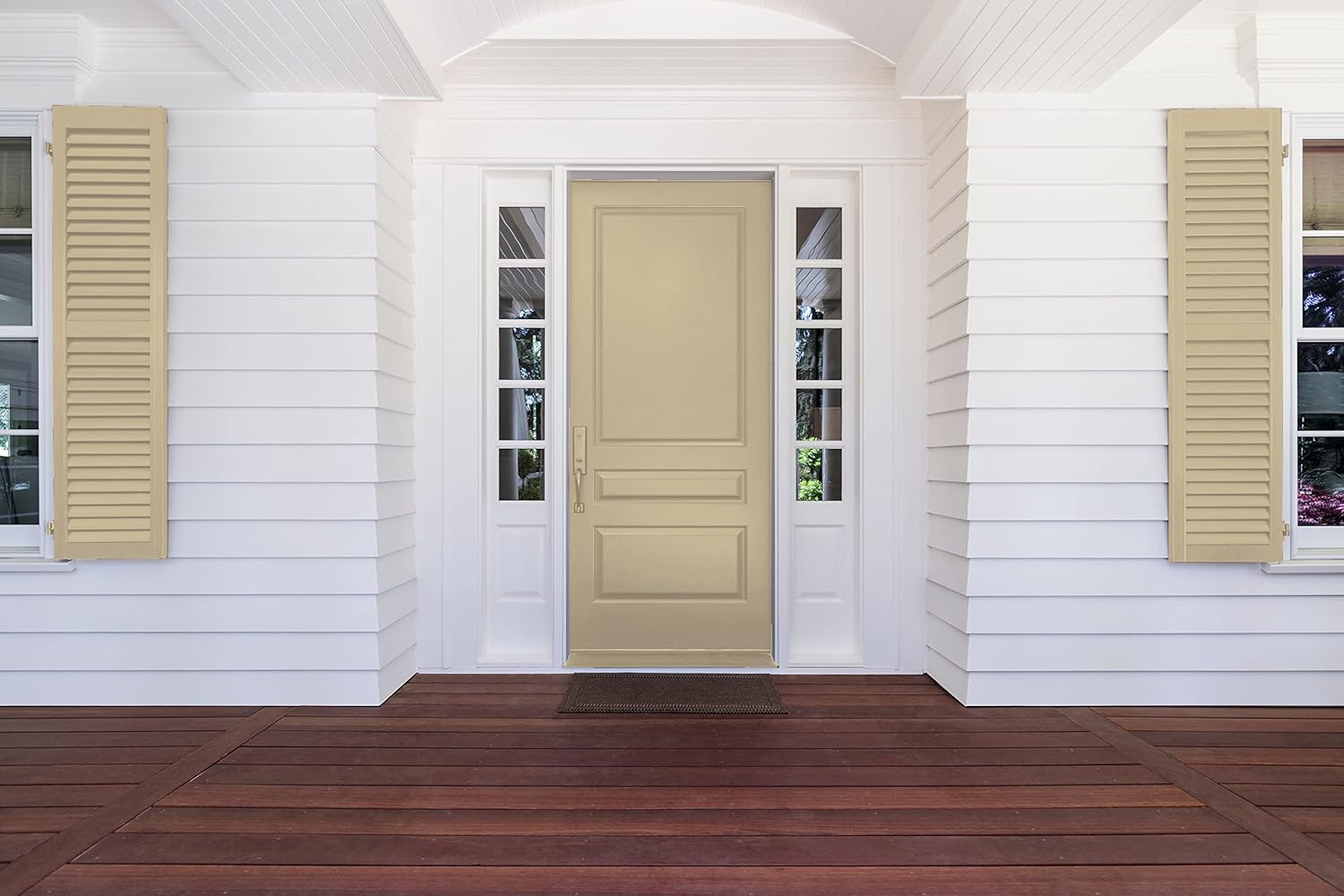 A modern living room with bold colors, a large gray sectional sofa, round white rug, small white table with plants, plaid blanket, fireplace in the corner, and a large window letting in natural light enhanced by premium paint on the walls.